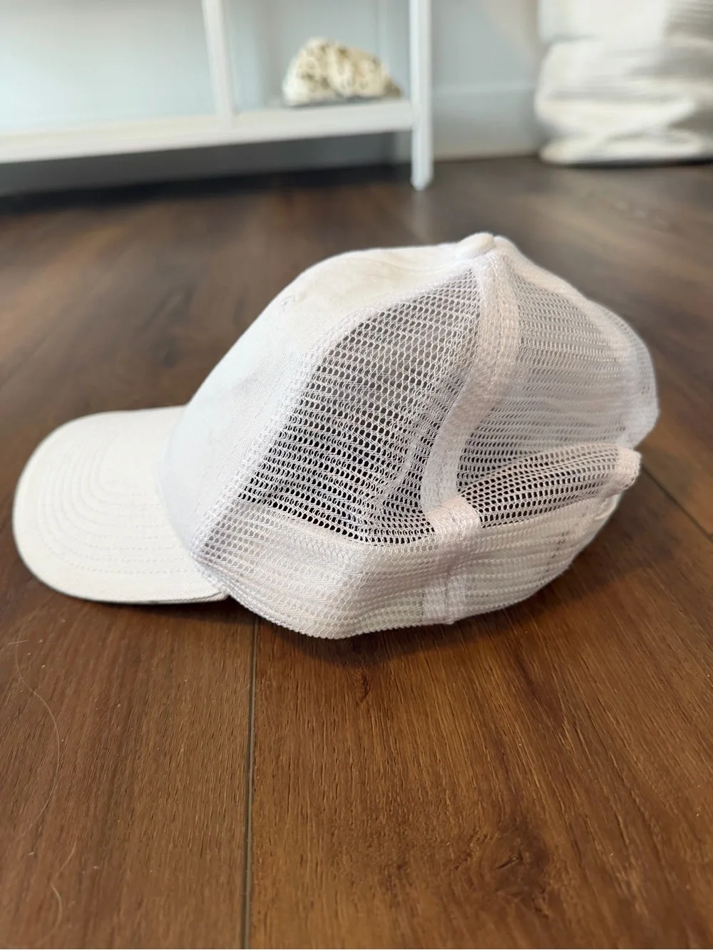 White Mesh-Back Hat with Yellow Smiley Patch